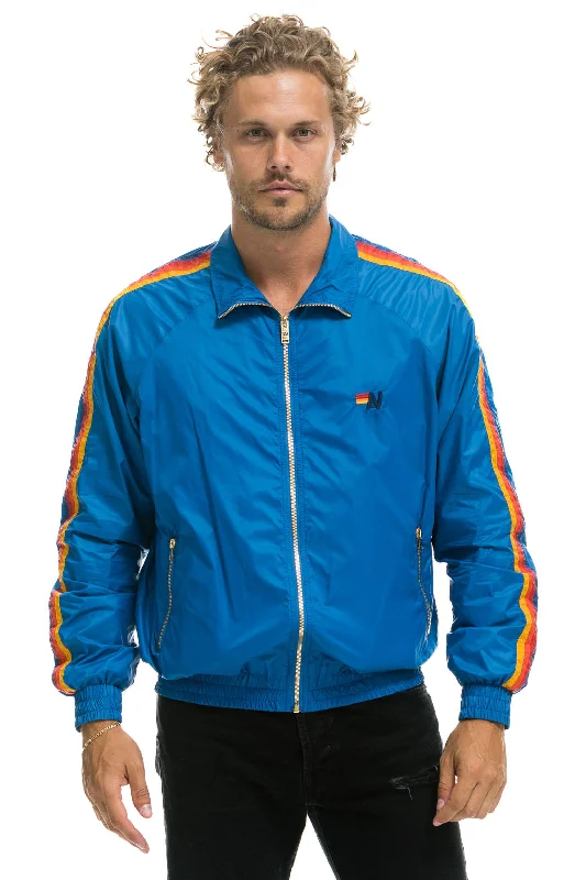 MEN'S 4 STRIPE WINDBREAKER -  SNORKEL BLUE